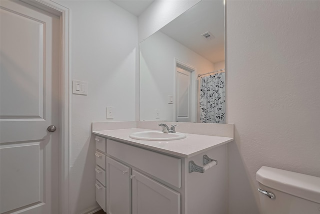 24119 Maple Turn Ln, Hockley, TX 77447 - bathroom with visible vents, toilet, and vanity