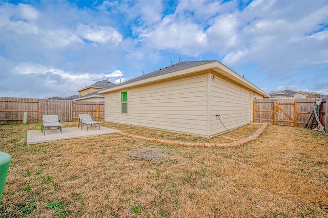 24119 Maple Turn Ln, Hockley, TX 77447 - rear view of property with a yard, a patio area, and a fenced backyard