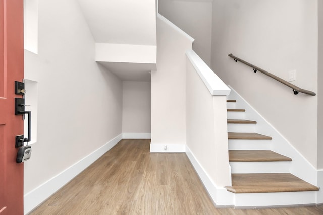 783 Mansfield St, Houston, TX 77091 - interior space featuring stairway, baseboards, and wood finished floors
