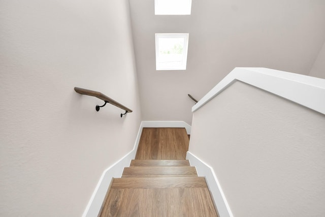 783 Mansfield St, Houston, TX 77091 - staircase featuring baseboards and wood finished floors