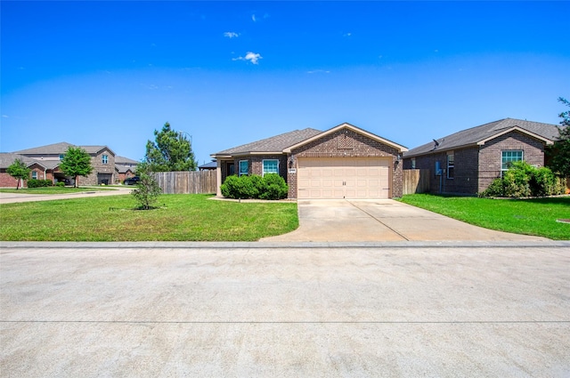 ranch-style home featuring fence, an attached garage, driveway, brick siding, and a front yard