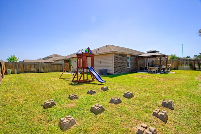 view of playground featuring central AC, a gazebo, and a lawn