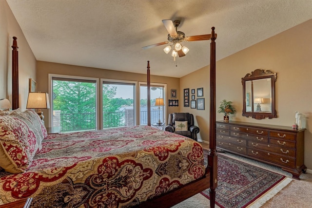 11831 Thoreau Dr, Montgomery, TX 77356 - carpeted bedroom with a textured ceiling, a ceiling fan, baseboards, and access to exterior