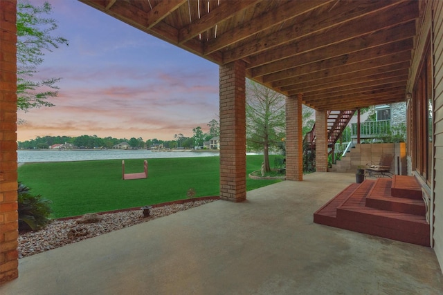 11831 Thoreau Dr, Montgomery, TX 77356 - view of patio / terrace featuring a water view and stairs