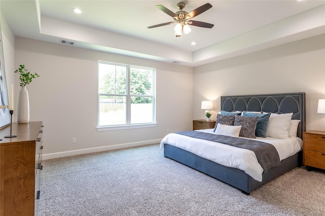 1114 Niagara St, Houston, TX 77051 - carpeted bedroom with recessed lighting, a raised ceiling, visible vents, a ceiling fan, and baseboards