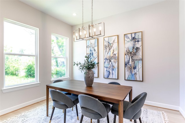 1114 Niagara St, Houston, TX 77051 - dining room featuring light wood finished floors, baseboards, recessed lighting, and a notable chandelier
