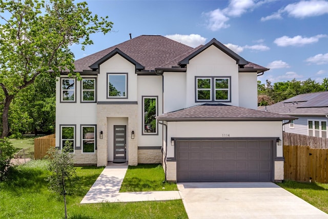 1114 Niagara St, Houston, TX 77051 - view of front of home with stucco siding, driveway, fence, and roof with shingles