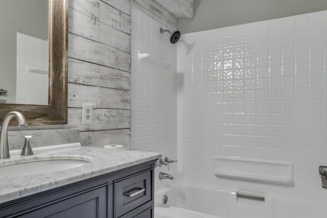 full bath with shower / bathtub combination, vanity, and decorative backsplash