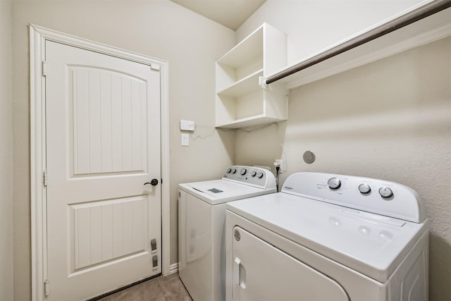 3754 Paladera Place Ct, Spring, TX 77386 - clothes washing area with washing machine and clothes dryer and laundry area