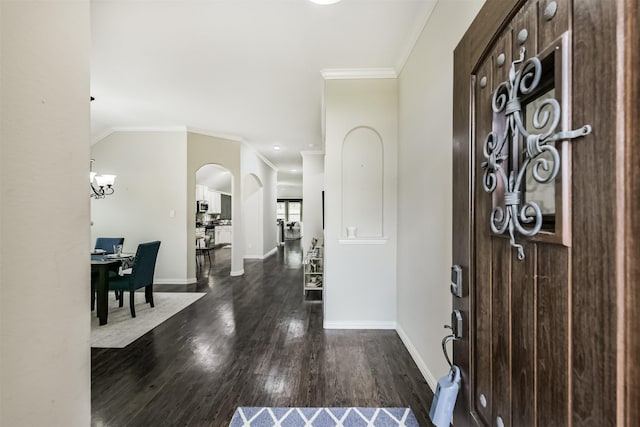 3754 Paladera Place Ct, Spring, TX 77386 - entryway with arched walkways, ornamental molding, dark wood-style floors, and baseboards