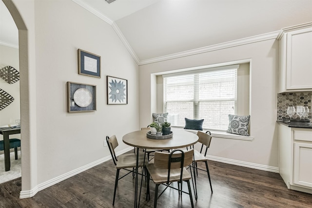 3754 Paladera Place Ct, Spring, TX 77386 - dining space featuring lofted ceiling, baseboards, crown molding, arched walkways, and dark wood-style floors