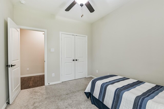3754 Paladera Place Ct, Spring, TX 77386 - carpeted bedroom with baseboards, a closet, and a ceiling fan