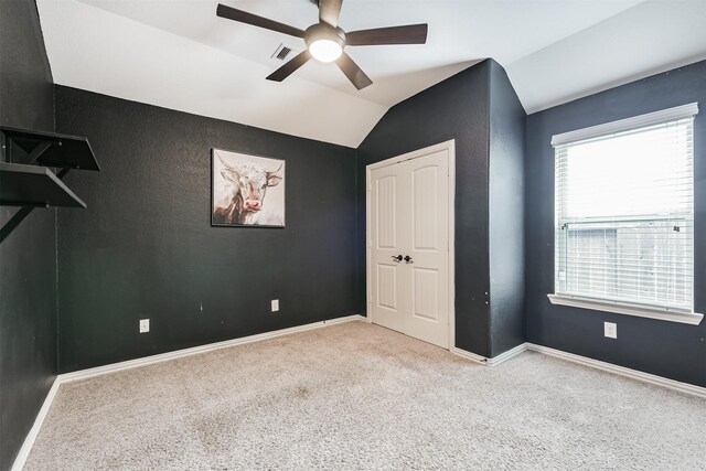 3754 Paladera Place Ct, Spring, TX 77386 - unfurnished bedroom featuring lofted ceiling, a ceiling fan, baseboards, carpet flooring, and visible vents