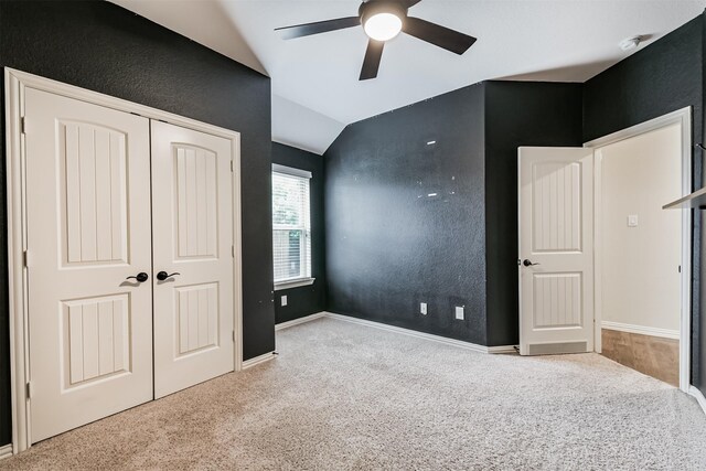 3754 Paladera Place Ct, Spring, TX 77386 - unfurnished bedroom with carpet, vaulted ceiling, ceiling fan, and a closet