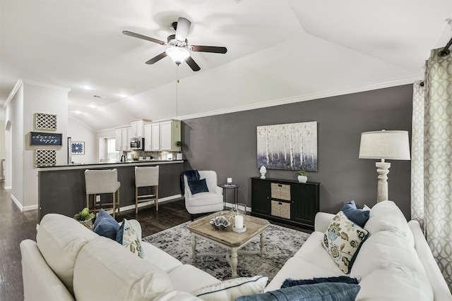 3754 Paladera Place Ct, Spring, TX 77386 - living room featuring dark wood finished floors, vaulted ceiling, baseboards, and a ceiling fan
