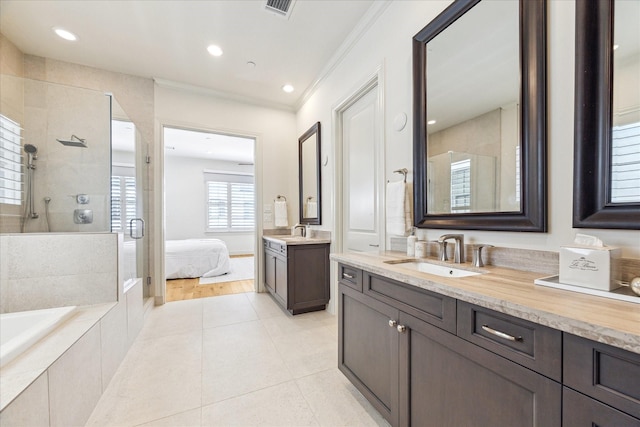 bathroom with crown molding, tile patterned floors, ensuite bathroom, a stall shower, and visible vents
