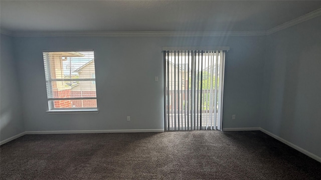 unfurnished room featuring dark colored carpet, baseboards, and ornamental molding