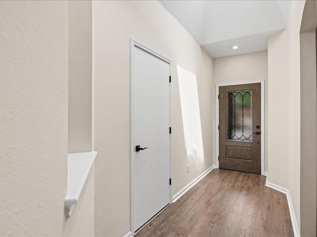 16339 Peach Orchard Dr, Humble, TX 77396 - corridor featuring baseboards and wood finished floors