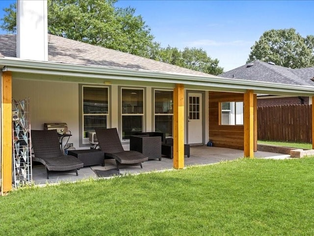 16339 Peach Orchard Dr, Humble, TX 77396 - back of property featuring fence, a yard, and a patio