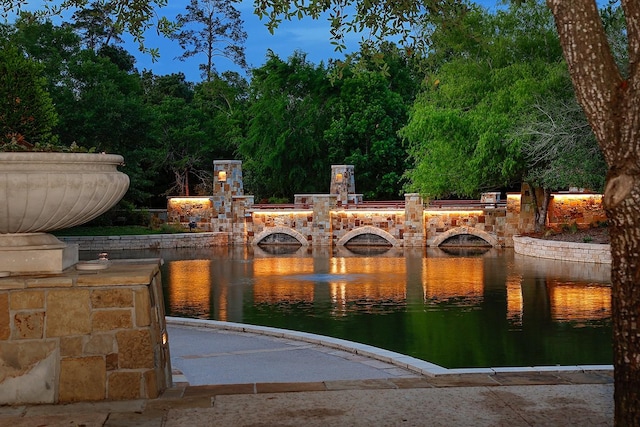 75 Colonial Row Dr, The Woodlands, TX 77380 - view of gate featuring a water view