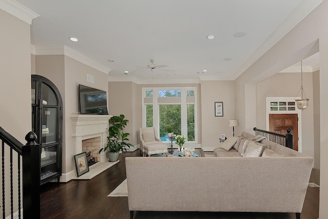 75 Colonial Row Dr, The Woodlands, TX 77380 - living room with a ceiling fan, a fireplace with raised hearth, baseboards, dark wood-style flooring, and recessed lighting