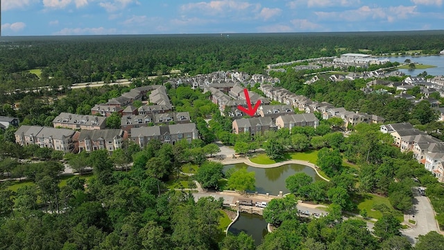75 Colonial Row Dr, The Woodlands, TX 77380 - aerial view featuring a forest view, a water view, and a residential view