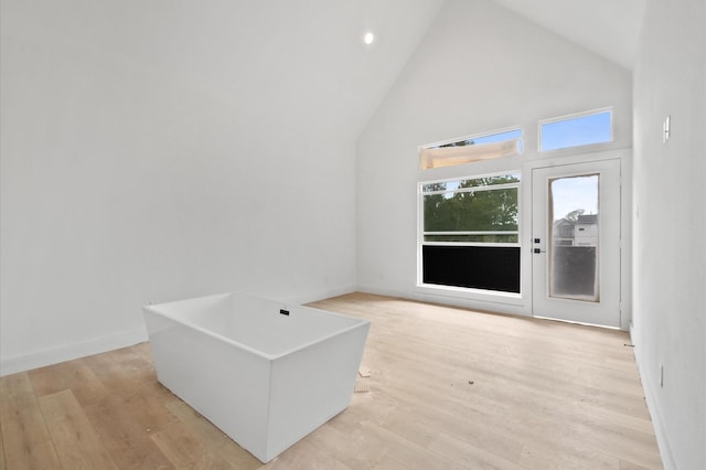 6703 Del Rio St, Houston, TX 77021 - unfurnished room with high vaulted ceiling, light wood-type flooring, and recessed lighting