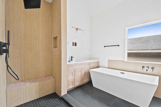 6703 Del Rio St, Houston, TX 77021 - bathroom with a soaking tub, vanity, and a shower