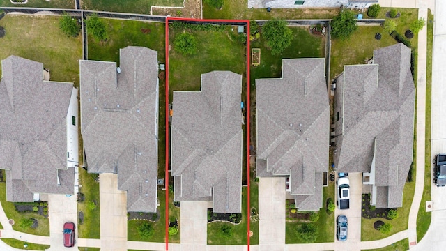 birds eye view of property with a residential view