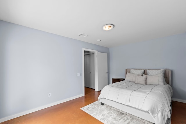 1522 Drew St, Houston, TX 77004 - bedroom featuring baseboards and concrete flooring