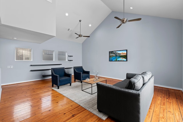 1522 Drew St, Houston, TX 77004 - living area with high vaulted ceiling, ceiling fan, recessed lighting, wood-type flooring, and baseboards