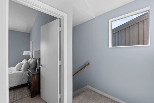 1522 Drew St, Houston, TX 77004 - stairs featuring lofted ceiling, carpet flooring, and baseboards