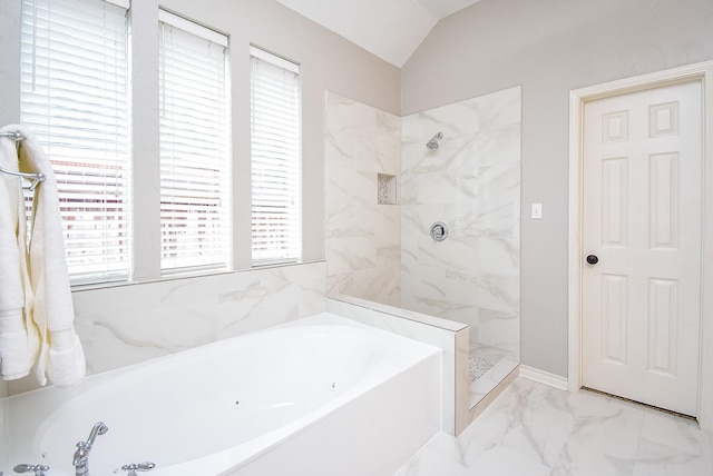 bathroom with walk in shower, a garden tub, marble finish floor, and lofted ceiling