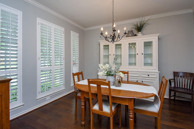dining space featuring ornamental molding, a chandelier, and dark wood-style floors