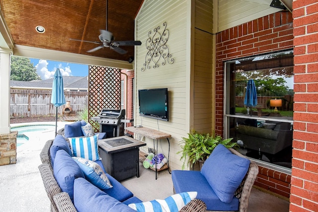 view of patio with a jacuzzi, outdoor lounge area, a ceiling fan, fence, and a grill