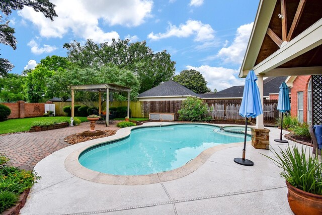 view of swimming pool with a fenced backyard, a gazebo, a patio, and a pool with connected hot tub
