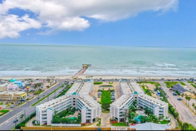 bird's eye view with a beach view and a water view