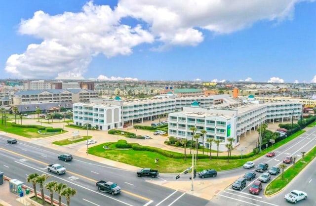 birds eye view of property with a view of city