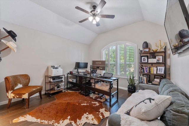 office area with baseboards, wood finished floors, a ceiling fan, and vaulted ceiling