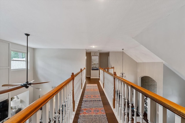 hallway with wood finished floors