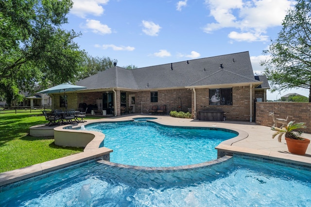 view of swimming pool with a fenced in pool, a patio, an in ground hot tub, and fence