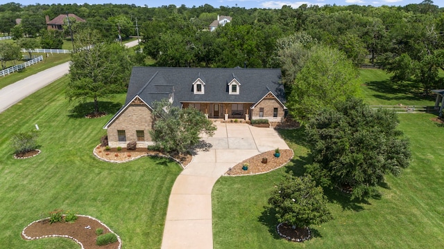 drone / aerial view with a view of trees