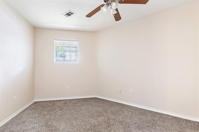 108 Harbour Town Cir, Conroe, TX 77356 - carpeted spare room with visible vents, a ceiling fan, and baseboards