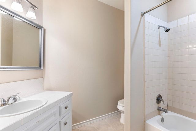 108 Harbour Town Cir, Conroe, TX 77356 - full bathroom with tasteful backsplash, tile patterned floors, vanity, washtub / shower combination, and toilet