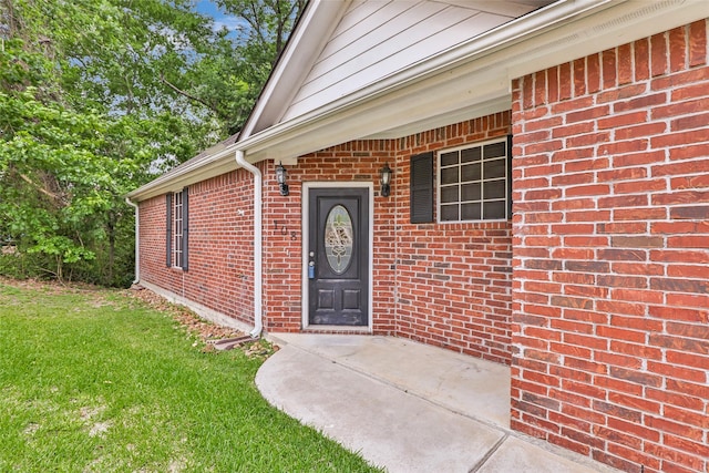 108 Harbour Town Cir, Conroe, TX 77356 - property entrance featuring brick siding and a lawn
