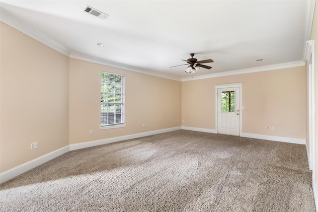 108 Harbour Town Cir, Conroe, TX 77356 - carpeted spare room featuring baseboards, a ceiling fan, visible vents, and crown molding