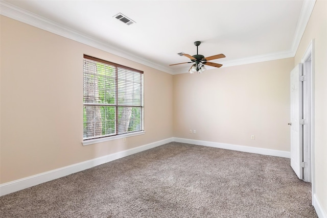 108 Harbour Town Cir, Conroe, TX 77356 - carpeted spare room with a ceiling fan, baseboards, crown molding, and visible vents