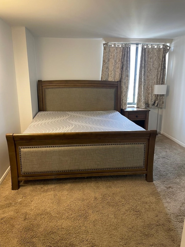 3525 Sage Rd Unit 1204, Houston, TX 77056 - bedroom featuring carpet floors and baseboards