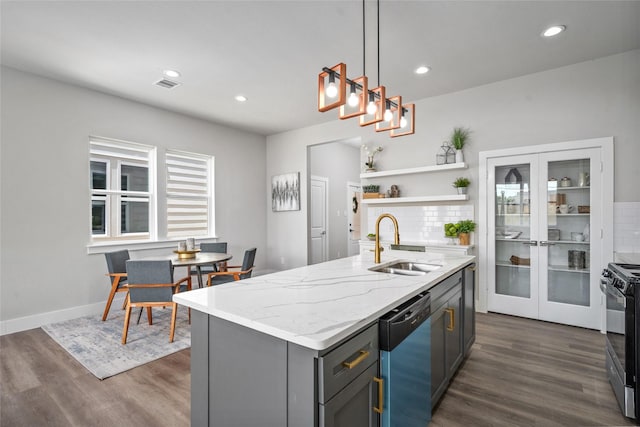 7228 Ave B, Houston, TX 77011 - kitchen with dishwasher, range with electric stovetop, decorative backsplash, dark wood-type flooring, and recessed lighting