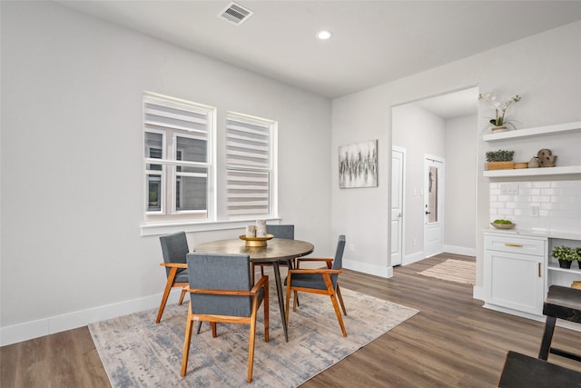 7228 Ave B, Houston, TX 77011 - dining room featuring dark wood-style floors and recessed lighting
